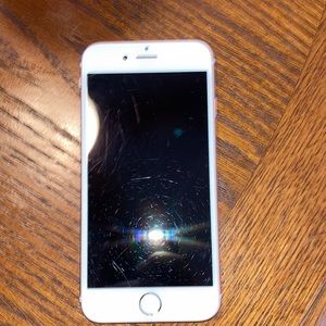 iPhone 6s some scratches but no cracks camera works great home button works.
